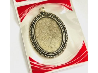 Medaljon metalni ovalni 4x5cm
